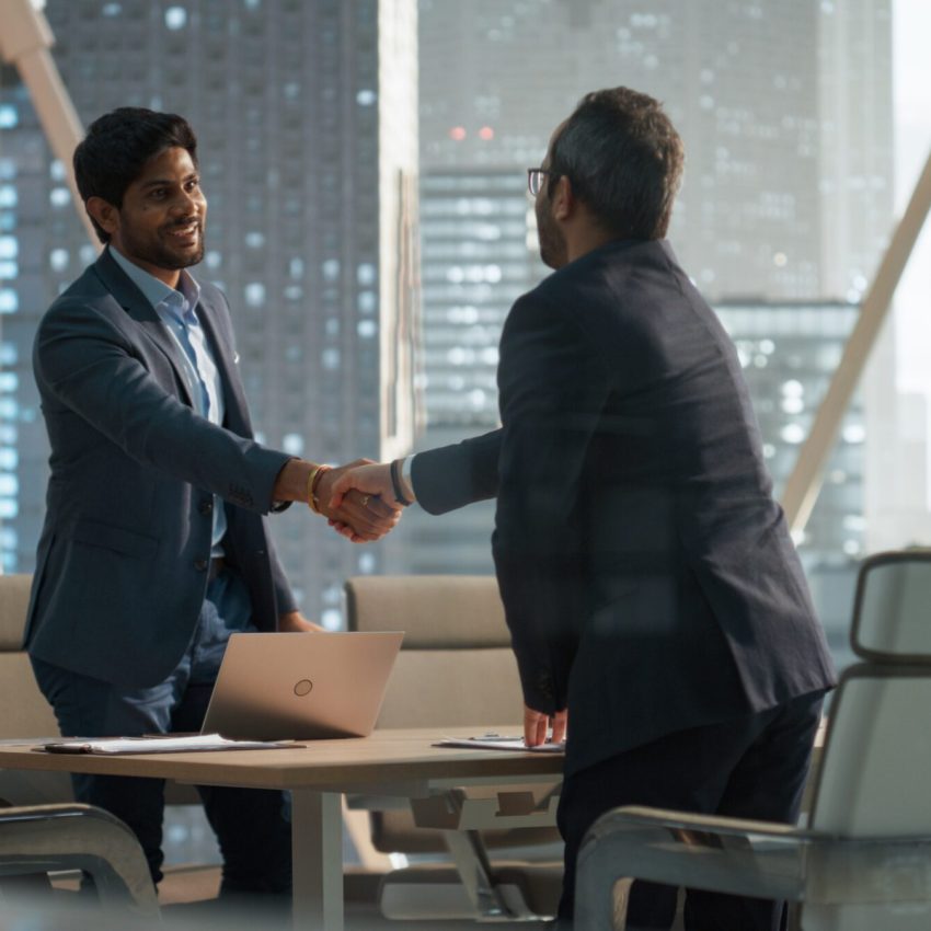 South,Asians,Business,Partners,Striking,A,Successful,Deal,At,A